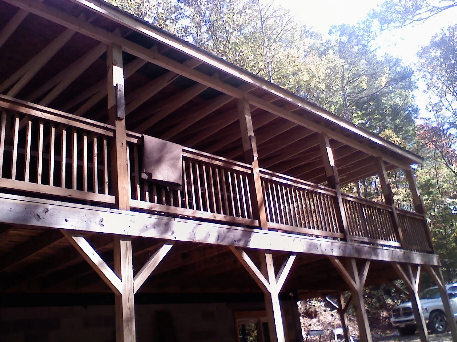 Timber framing under a new elevated porch and deck — Roof Leak Repair in East Peoria by Roofing Brothers